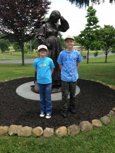 My niece, Abby and nephew, Nathan in front of the statue of Elizabeth Thorn.